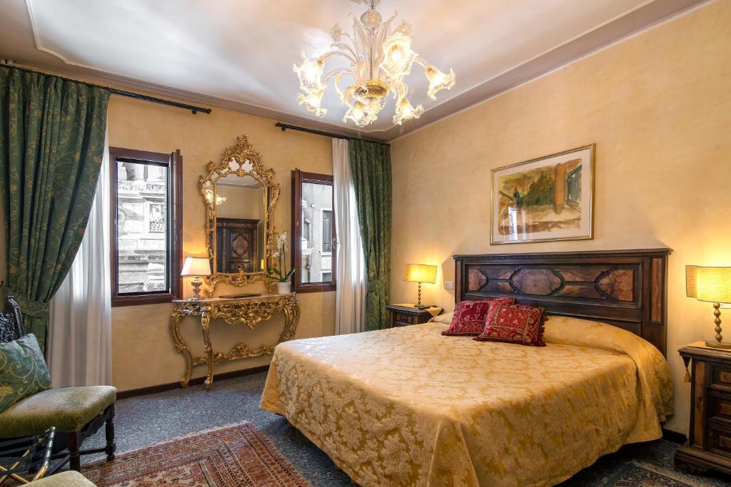 Hotel Bel Sito e Berlinoにあるベッド