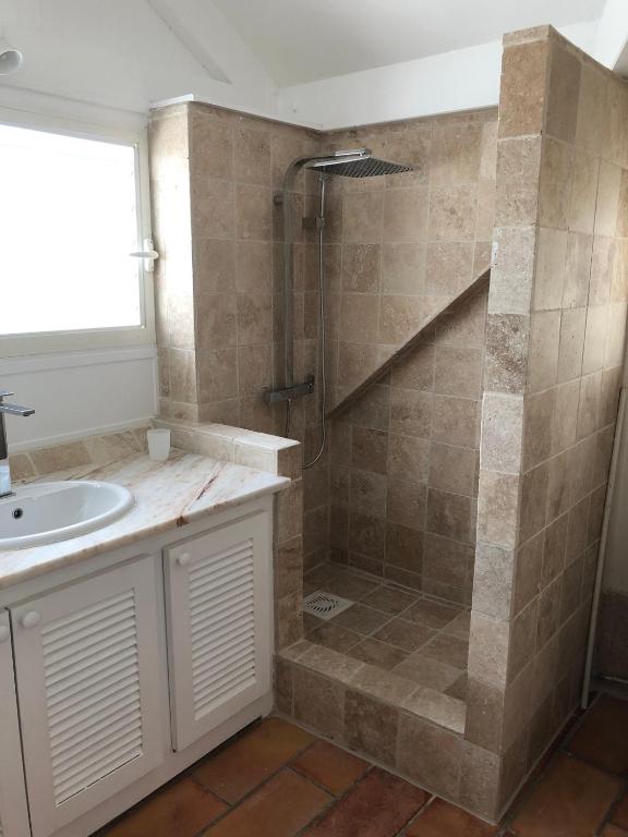 Koupelna v ubytování Duplex luxe au NBBC , les pieds dans le sable