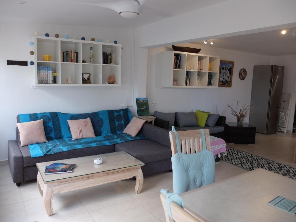 Posezení v ubytování Duplex luxe au NBBC , les pieds dans le sable