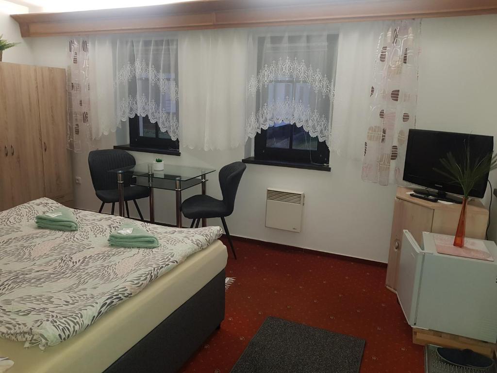 TV a/nebo společenská místnost v ubytování U Královny Dagmar
