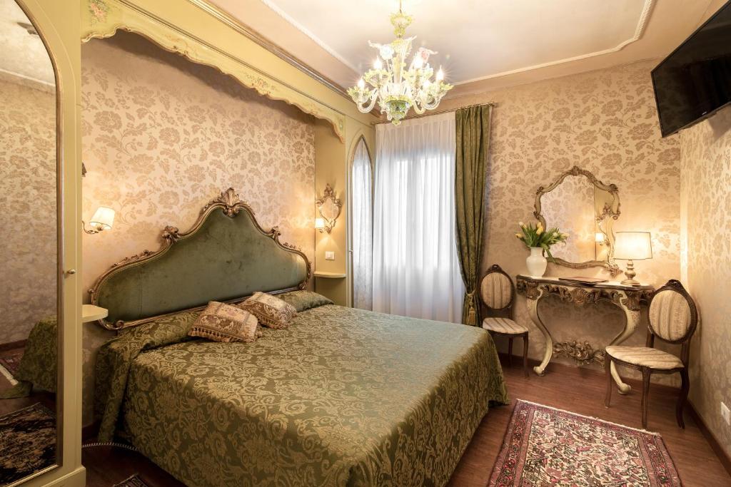 Hotel Bel Sito e Berlinoにあるベッド