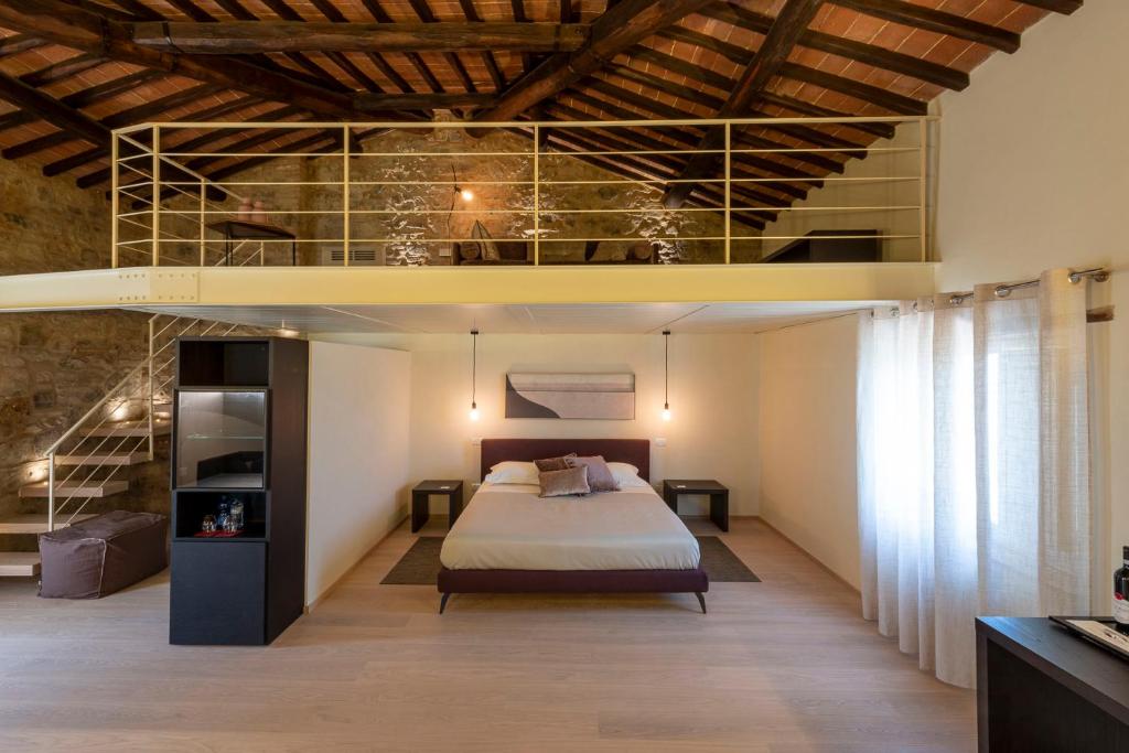 A bed or beds in a room at Mastrojanni Relais