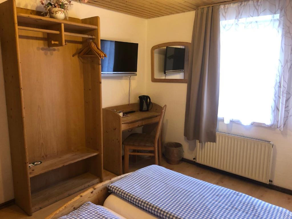 TV a/nebo společenská místnost v ubytování Hostaria del Castello