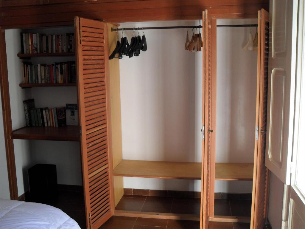 Postel nebo postele na pokoji v ubytování i gù books & rooms