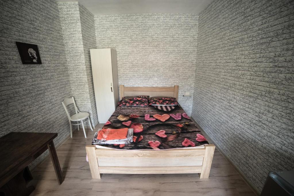 Postel nebo postele na pokoji v ubytování happy pandasN12