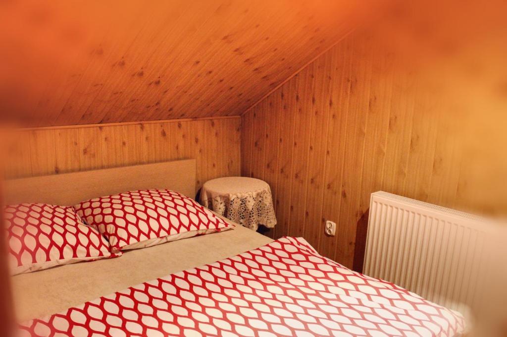Posteľ alebo postele v izbe v ubytovaní Pati Apartament Słonko