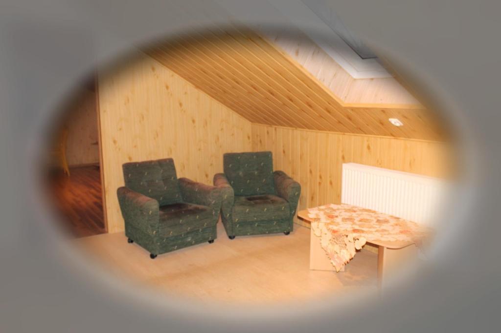 Posedenie v ubytovaní Pati Apartament Słonko