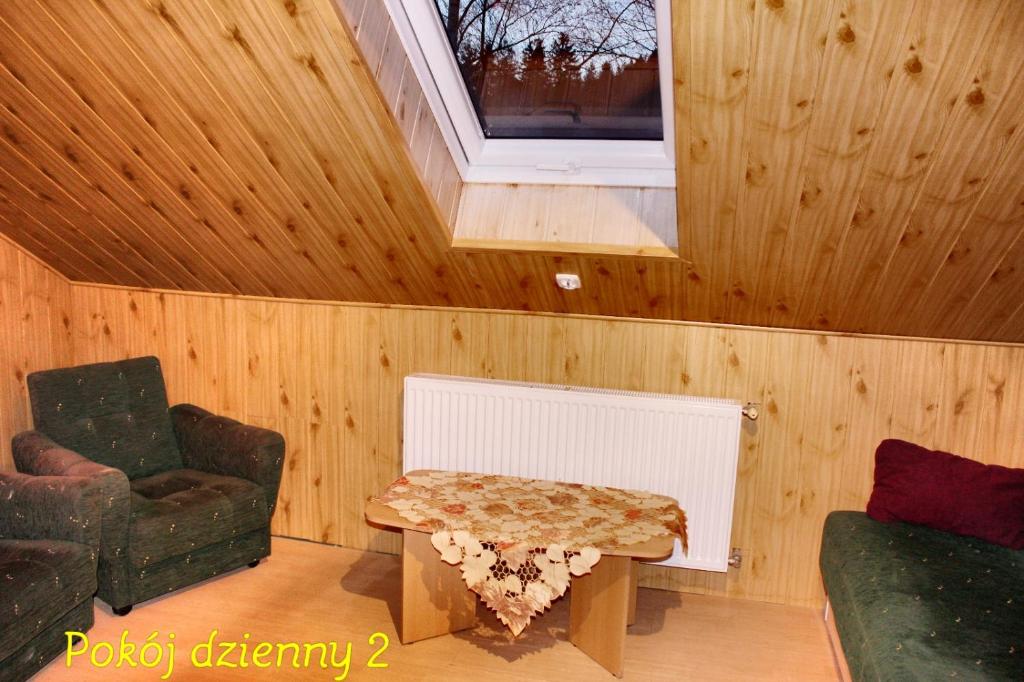 Posedenie v ubytovaní Pati Apartament Słonko