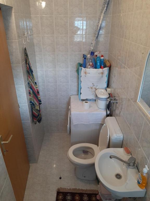 Koupelna v ubytování Mimy Rooms