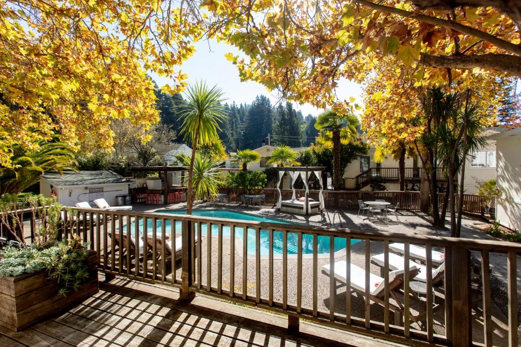 a backyard with a pool and a fence at boon hotel + spa - adults only in Guerneville