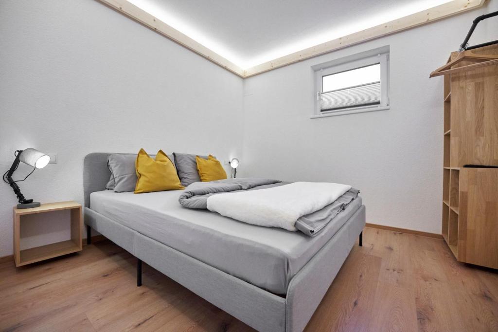Postel nebo postele na pokoji v ubytování Appartement Alpen Flair