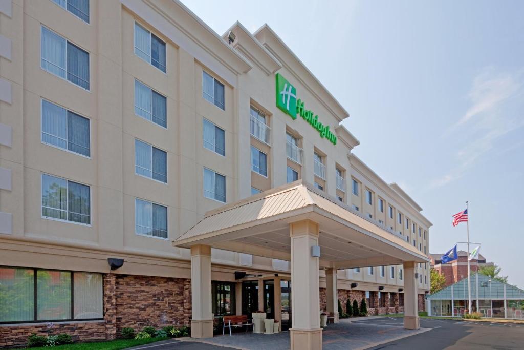 a hotel with a sign on the front of it at Holiday Inn Portsmouth, an IHG Hotel in Portsmouth