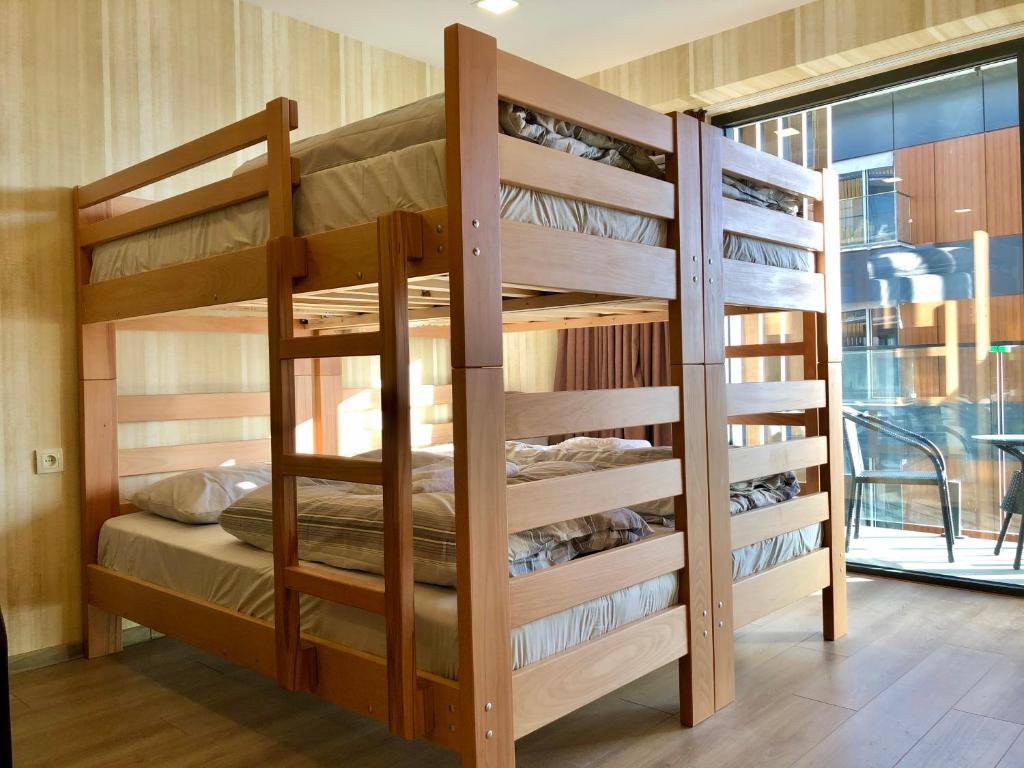 Postel nebo postele na pokoji v ubytování GVC 315 Atrium New Gudauri