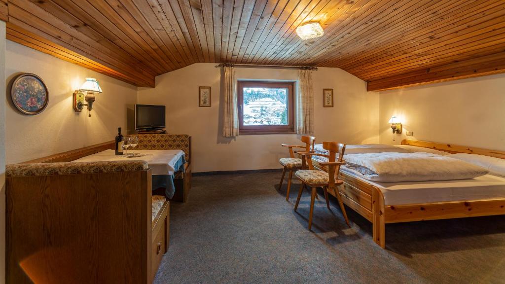 Posteľ alebo postele v izbe v ubytovaní Residence Soratru