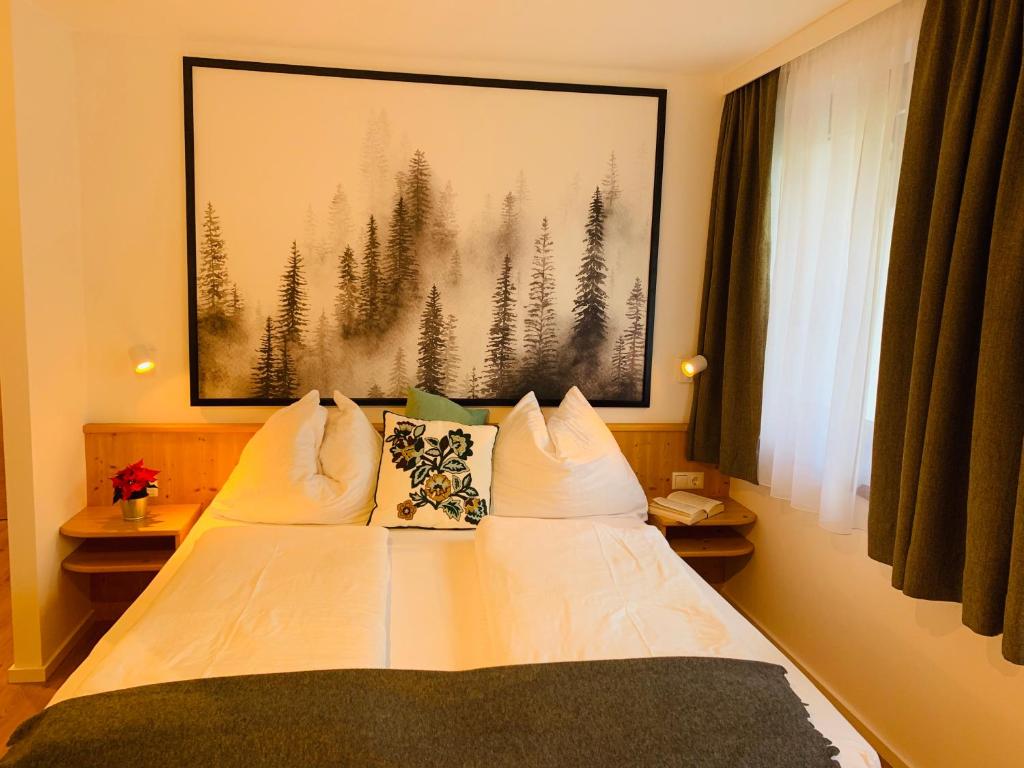 Postel nebo postele na pokoji v ubytování Gasthof Schöntal