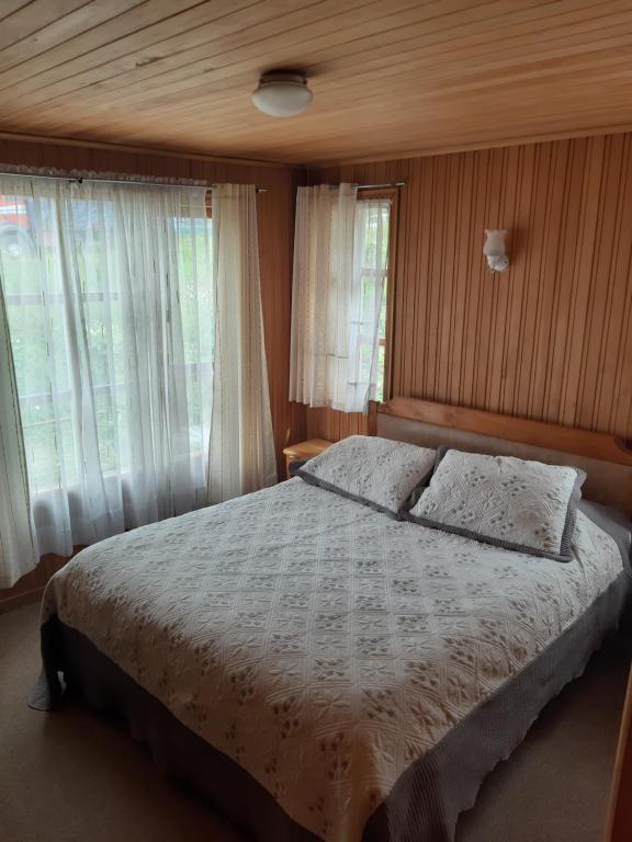 Postel nebo postele na pokoji v ubytování Cabañas Don Foncho