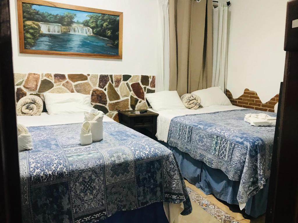 Voodi või voodid majutusasutuse Hotel Boutique Casa José toas