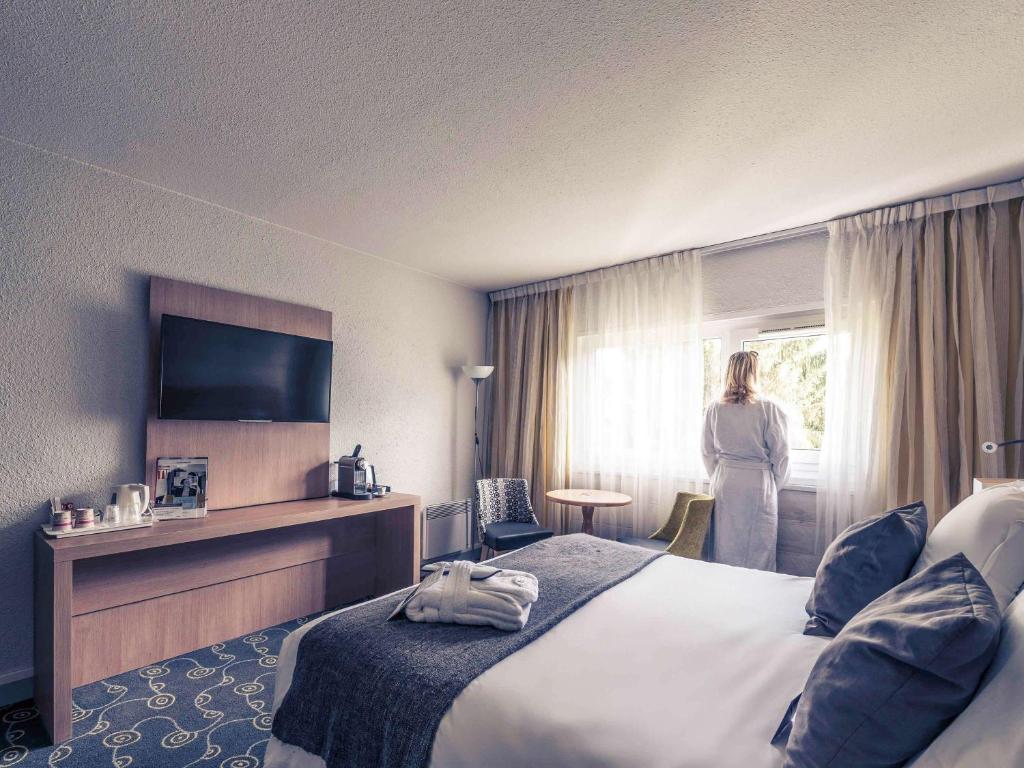 Postel nebo postele na pokoji v ubytování Mercure Annecy Sud