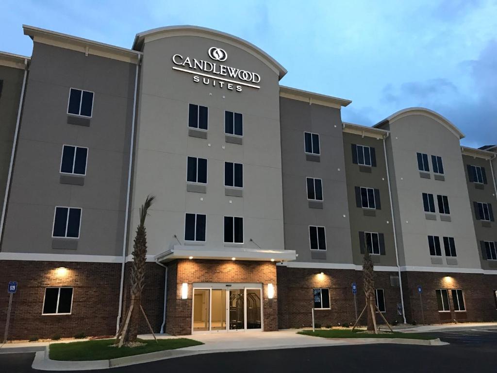 a rendering of the entrance to a hotel at Candlewood Suites Valdosta Mall, an IHG Hotel in Valdosta
