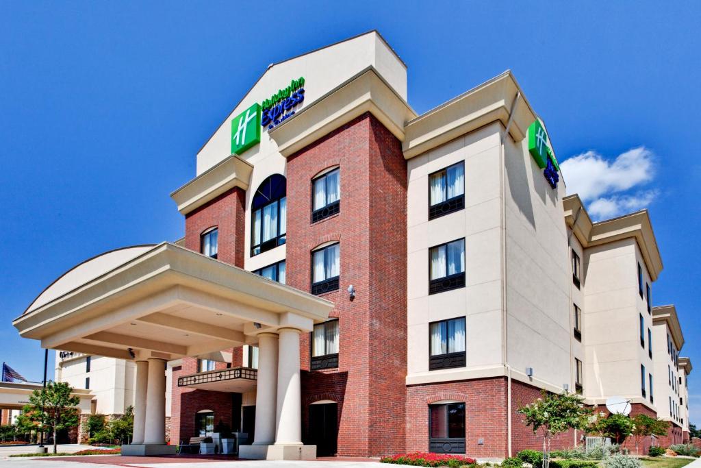 a rendering of the front of a hotel at Holiday Inn Express Hotel & Suites DFW West - Hurst, an IHG Hotel in Hurst
