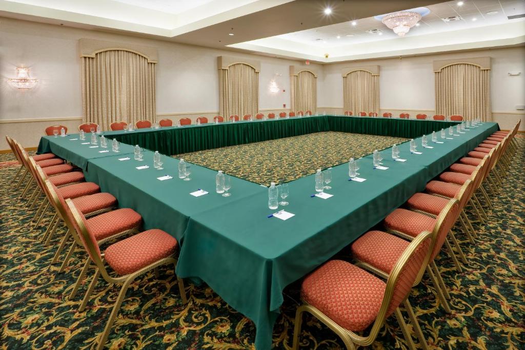 a large conference table in a room with chairs at Holiday Inn Express Hotel & Suites Easton by IHG in Easton