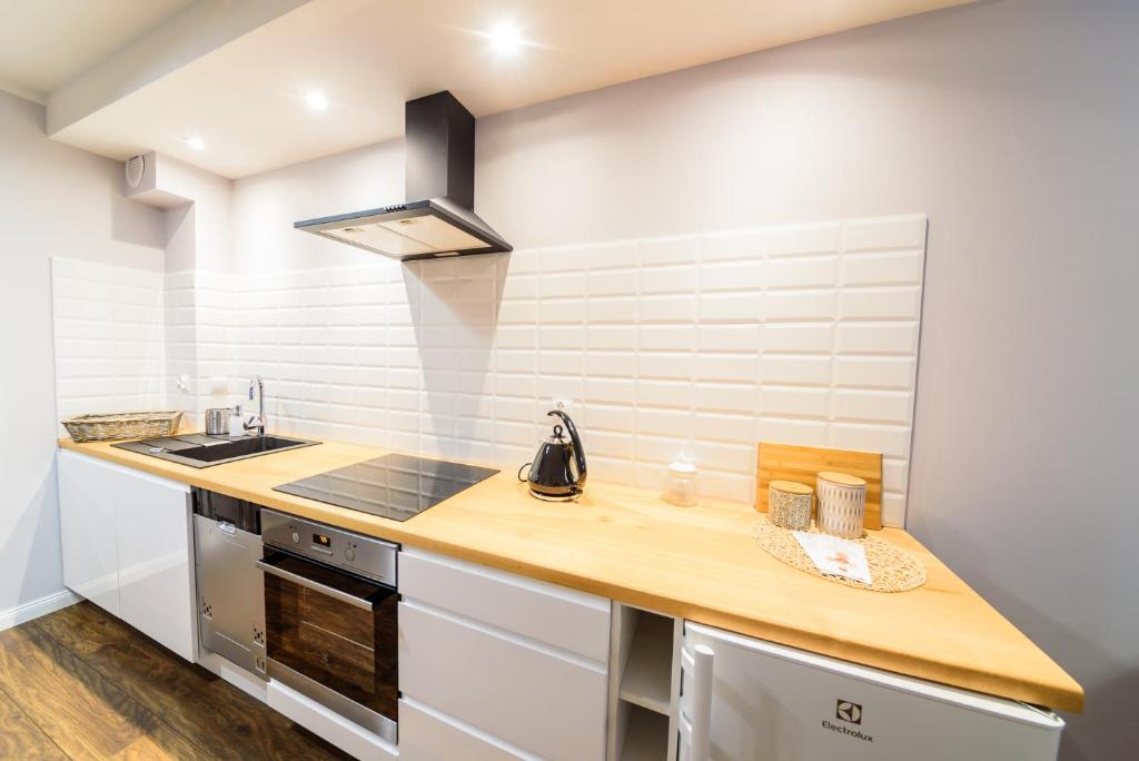 Kuchyňa alebo kuchynka v ubytovaní Apartament Zaciszny