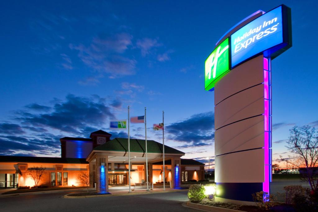a gas station with a sign in front of it at Holiday Inn Express Cambridge, an IHG Hotel in Cambridge