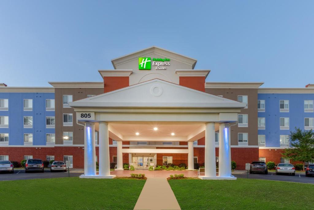 a hotel front of a building with a gazebo at Holiday Inn Express Arrowood, an IHG Hotel in Charlotte