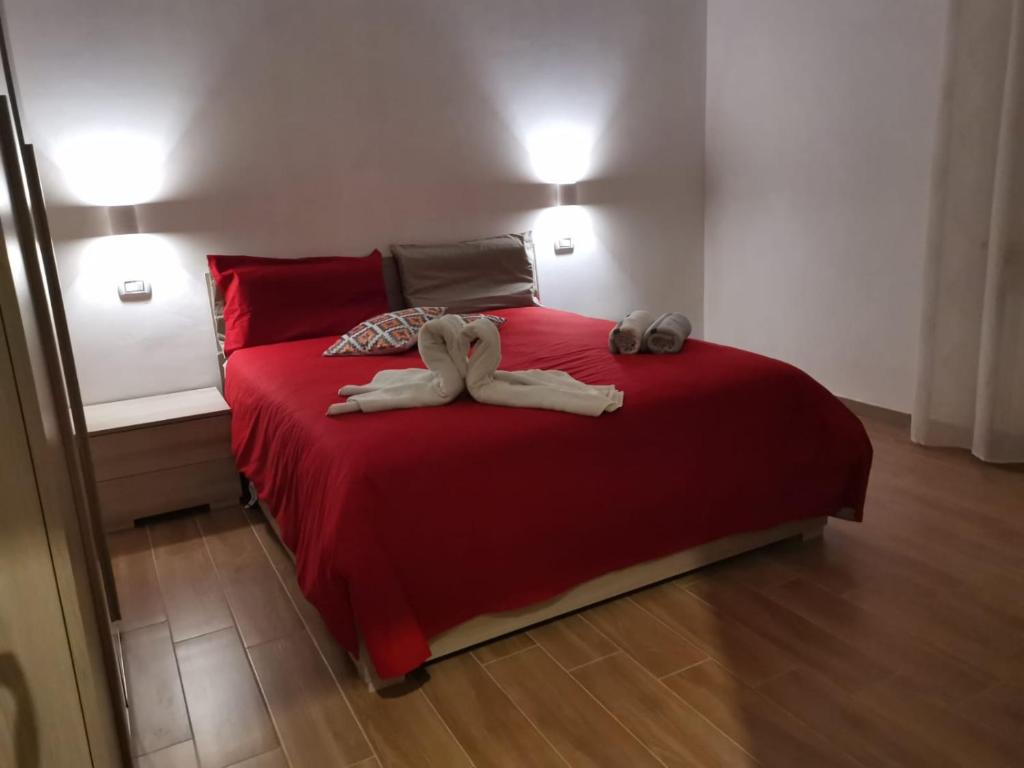 A bed or beds in a room at B&B Belli Dentro