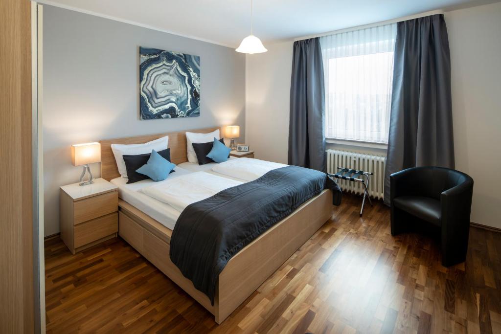 Ένα ή περισσότερα κρεβάτια σε δωμάτιο στο Hotel Birkenstern