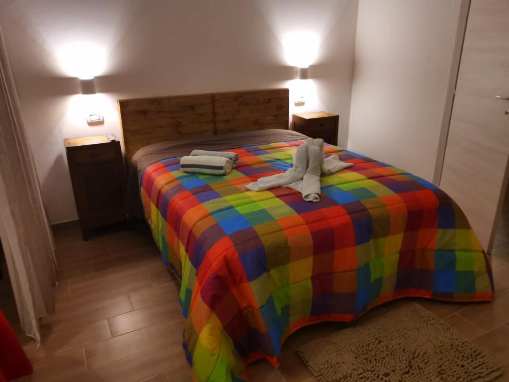 A bed or beds in a room at B&B Belli Dentro