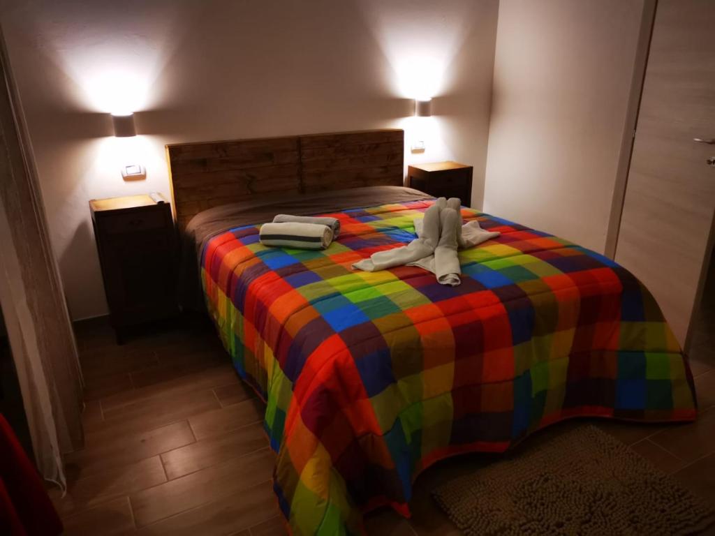 A bed or beds in a room at B&B Belli Dentro