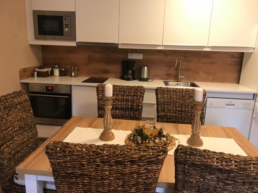 Kuchyň nebo kuchyňský kout v ubytování Apartmány Gryf Harrachov