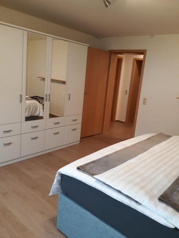Postel nebo postele na pokoji v ubytování Haus Wassermann