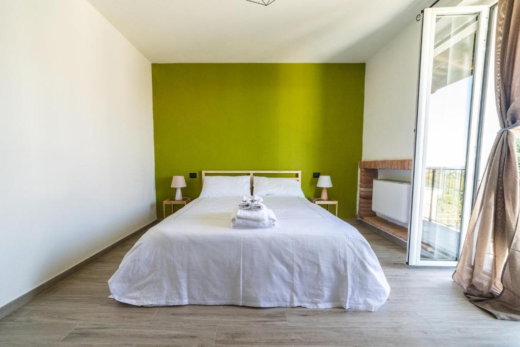 Postel nebo postele na pokoji v ubytování Locanda Stardé