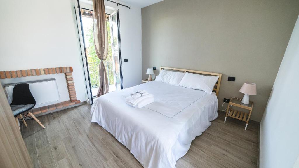 Postel nebo postele na pokoji v ubytování Locanda Stardé