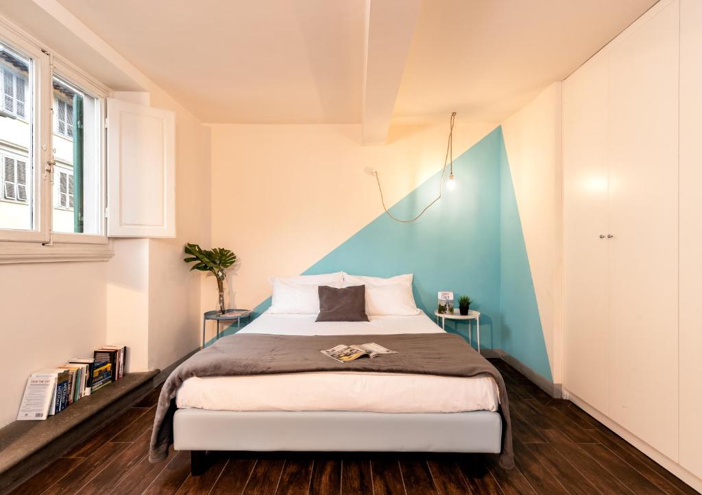 Posteľ alebo postele v izbe v ubytovaní Historic Center apartment - Next to the river, all attractions - By LikeHomeFlorence