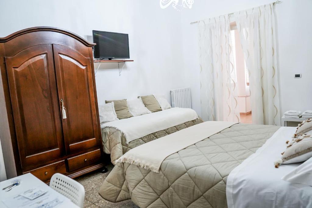 Postel nebo postele na pokoji v ubytování il MaRì
