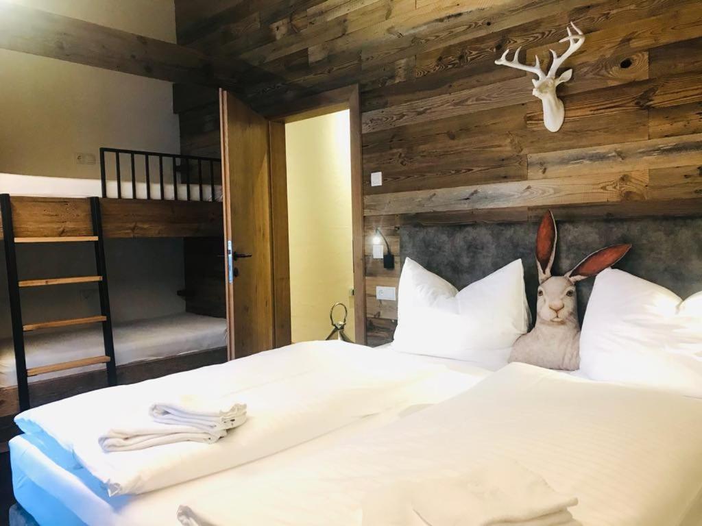Postel nebo postele na pokoji v ubytování Sieglhub Chalets - Appartements - Hotel