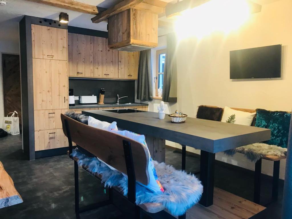 Kuchyň nebo kuchyňský kout v ubytování Sieglhub Chalets - Appartements - Hotel