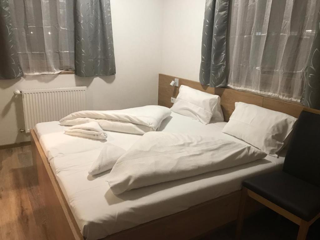 Postel nebo postele na pokoji v ubytování Appartements Hirner