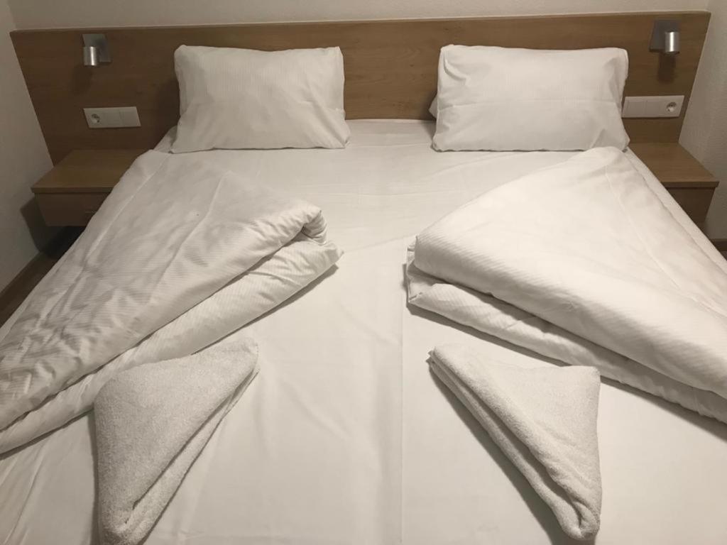 Postel nebo postele na pokoji v ubytování Appartements Hirner