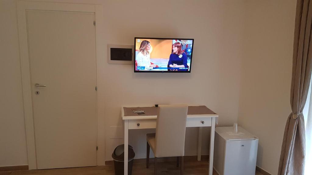 Telewizja i/lub zestaw kina domowego w obiekcie Royal House