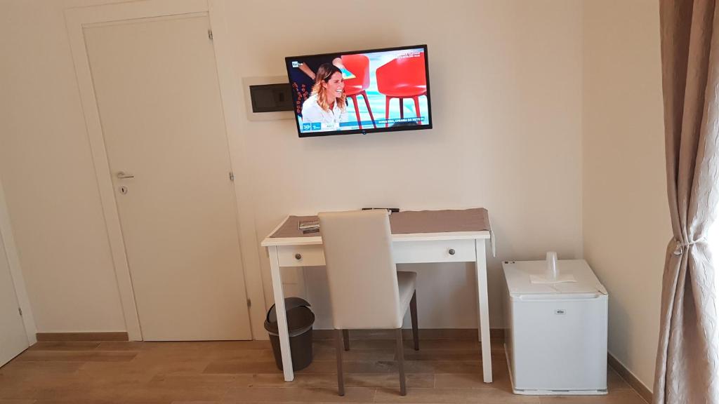Telewizja i/lub zestaw kina domowego w obiekcie Royal House