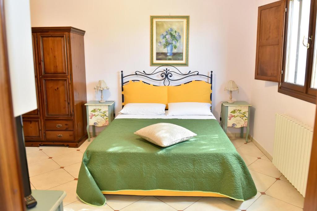 Łóżko lub łóżka w pokoju w obiekcie B&B Villa Anastasia Club