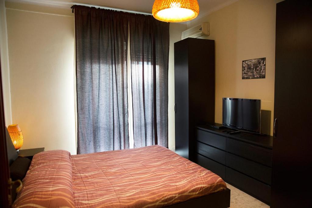 מיטה או מיטות בחדר ב-Oltremare House