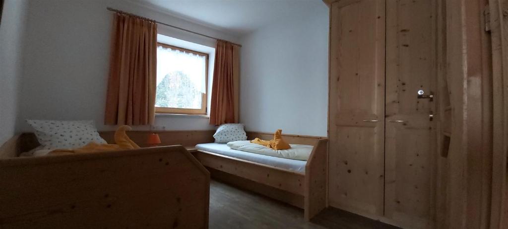 Postel nebo postele na pokoji v ubytování Romantikferienhaus am Brändle