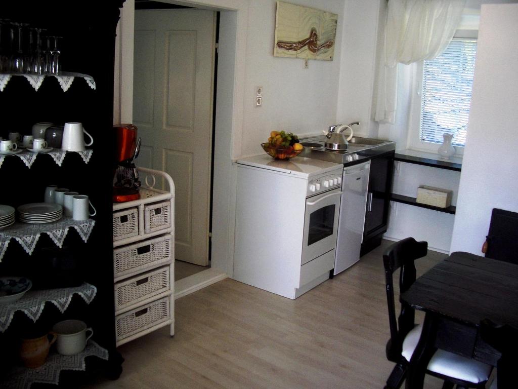 Kuchnia lub aneks kuchenny w obiekcie Roomantic Apartments