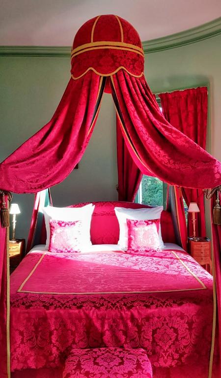 Llit o llits en una habitaci&oacute; de Ch&acirc;teau de Chantore