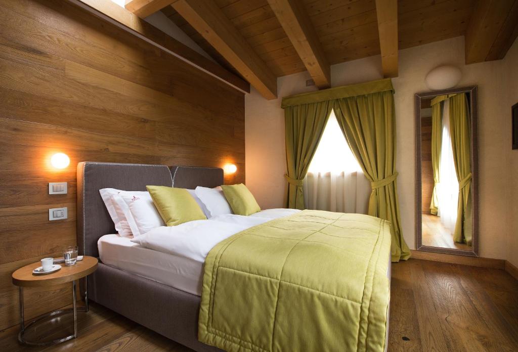Postel nebo postele na pokoji v ubytování Sottovento Luxury Hospitality